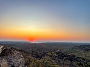 View of a sunset on top of a mountain