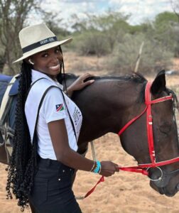 Miss World Namibia and a horse.
