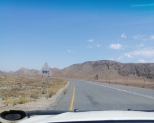 High wind warning on desert road.