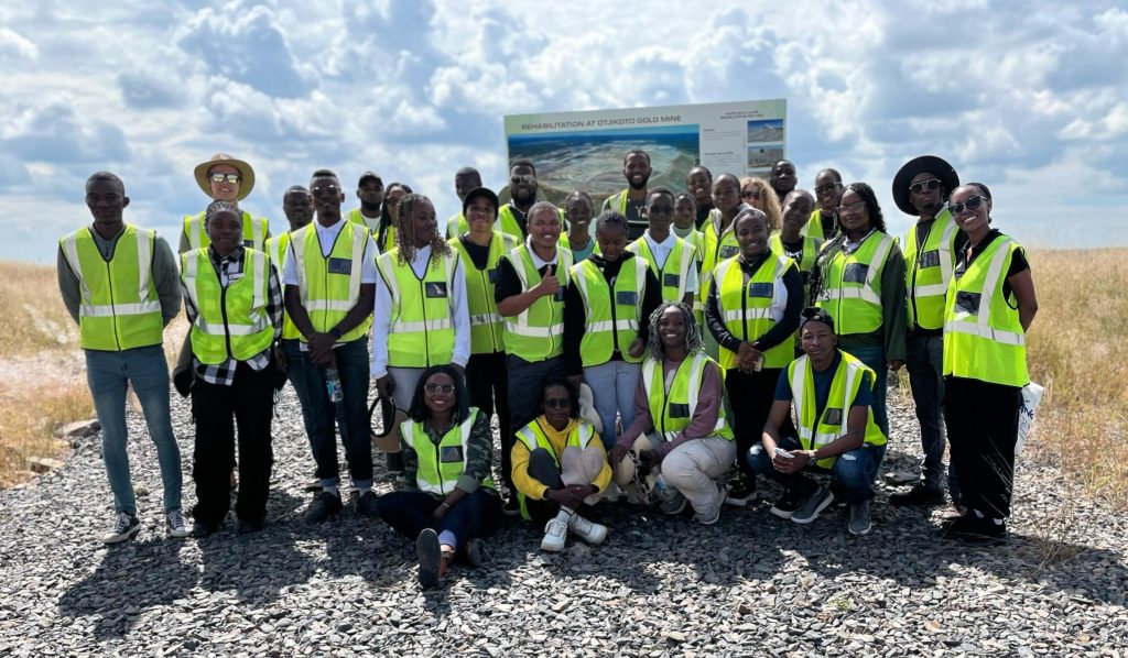 A group of people wearing reflector vests
