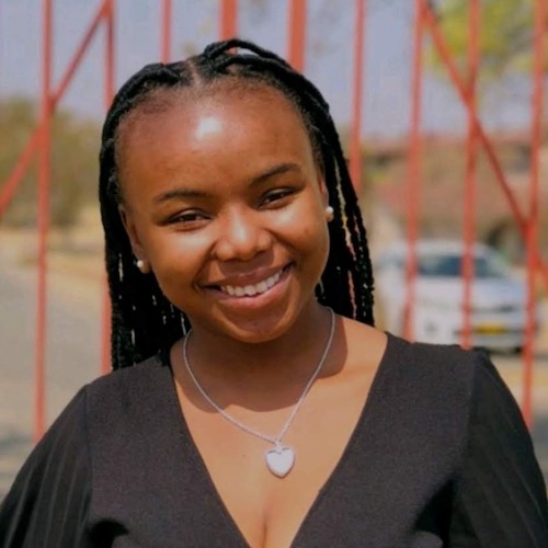 Close up of Otillie Fillipus, smiling.